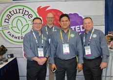 The team of Naturipe Farms in its rebranded booth. From left to right: Joe Dugo, Kasey Kelley, German Llanten and Archie Taylor.